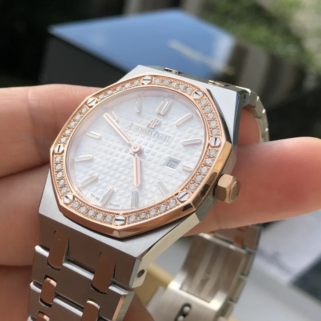 two-tone steel and gold white dial — photographed off the sweep