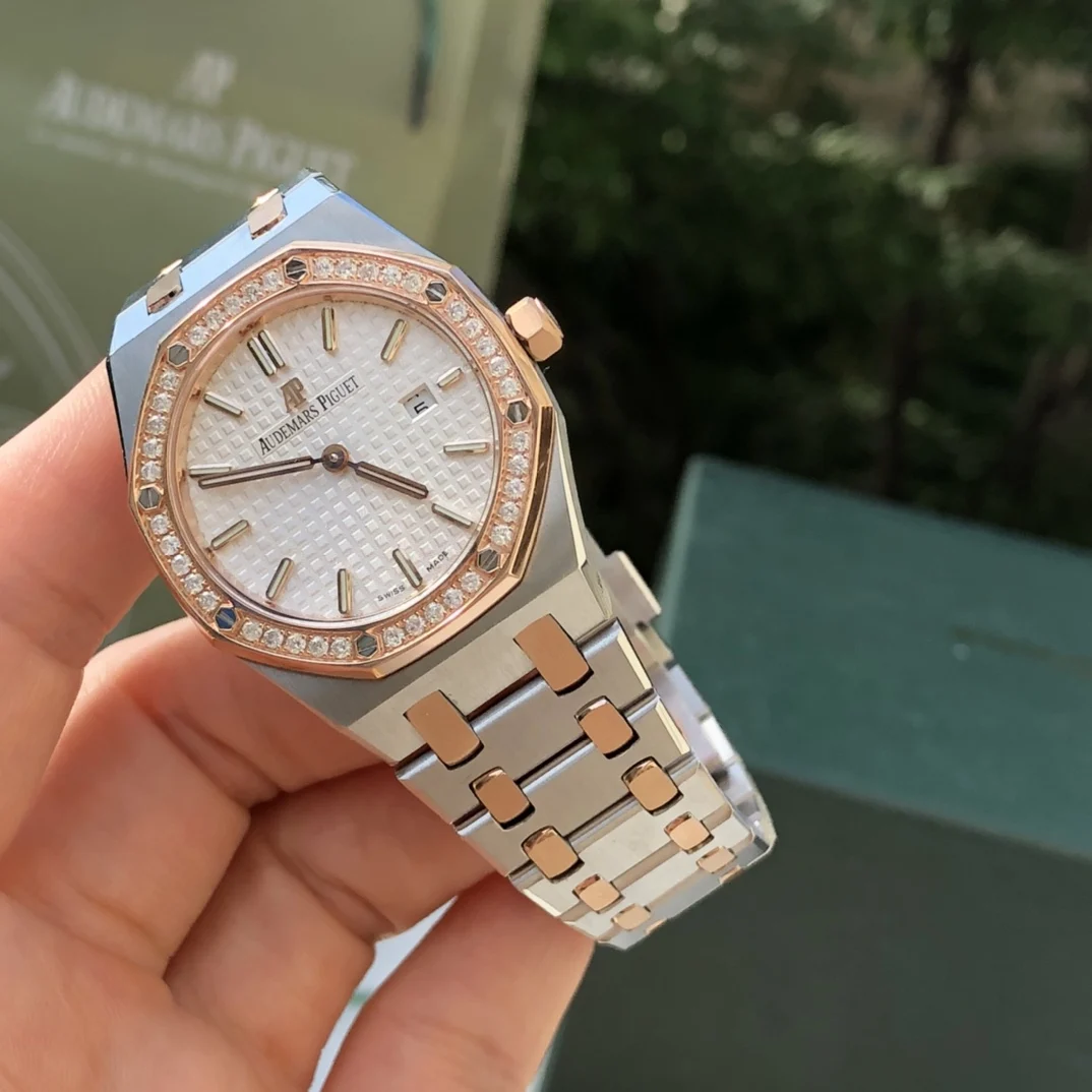 two-tone steel and gold white dial — photographed off the sweep