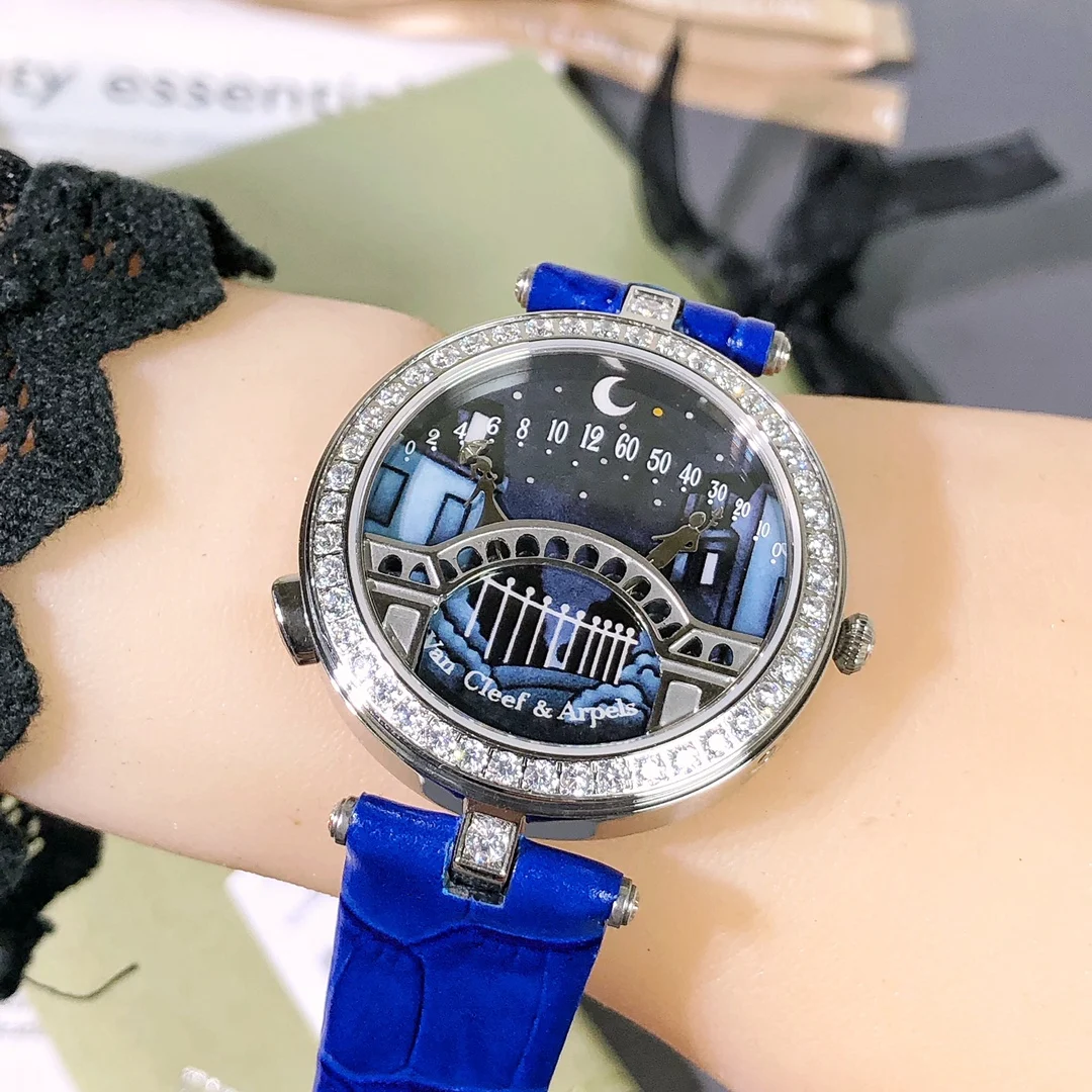 VCA Van Cleef & Arpels Lovers' Bridge Kissing Watch Latest — photographed off the sweep