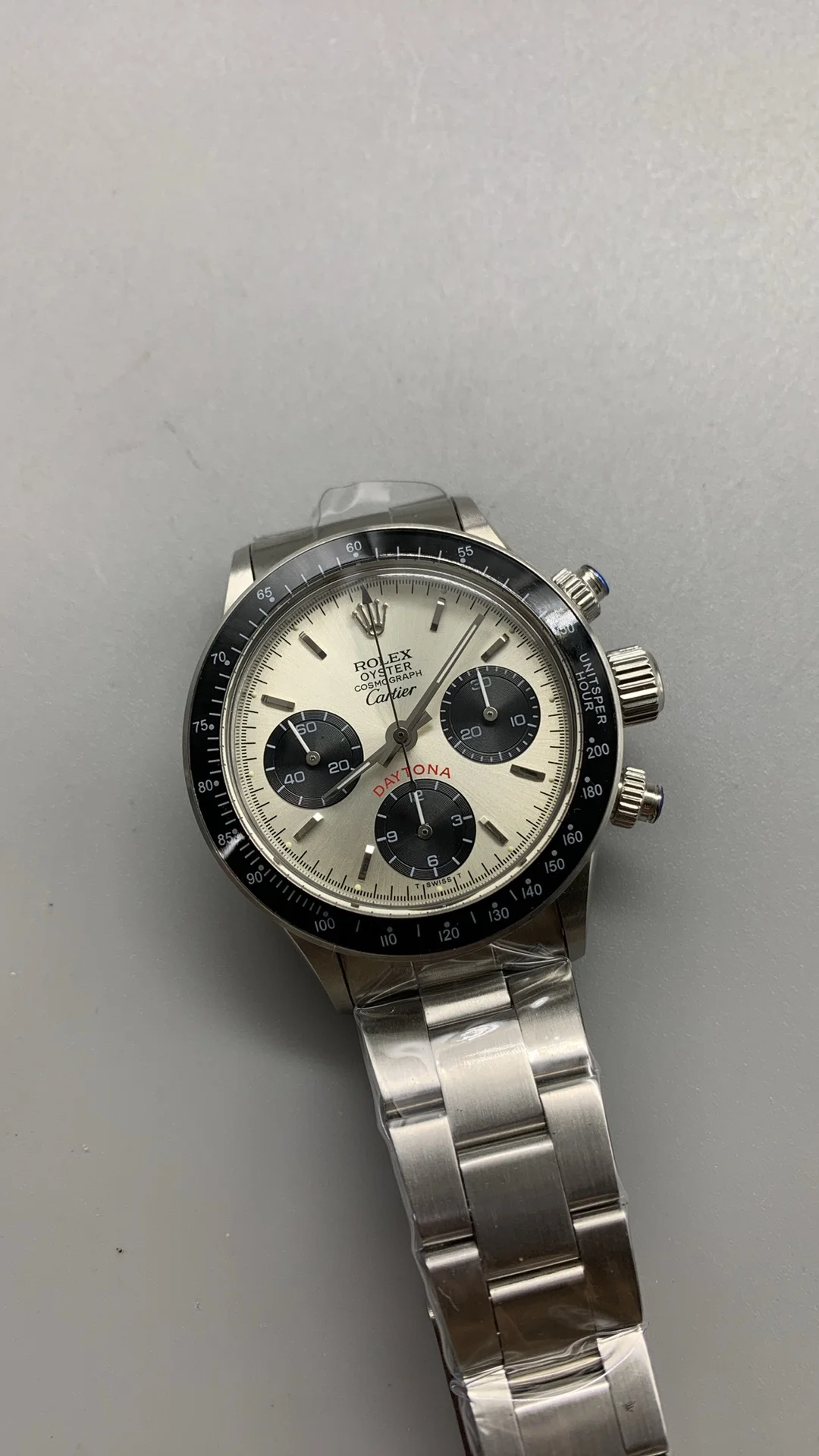 Vintage Daytona, Cartier dial — photographed off the sweep