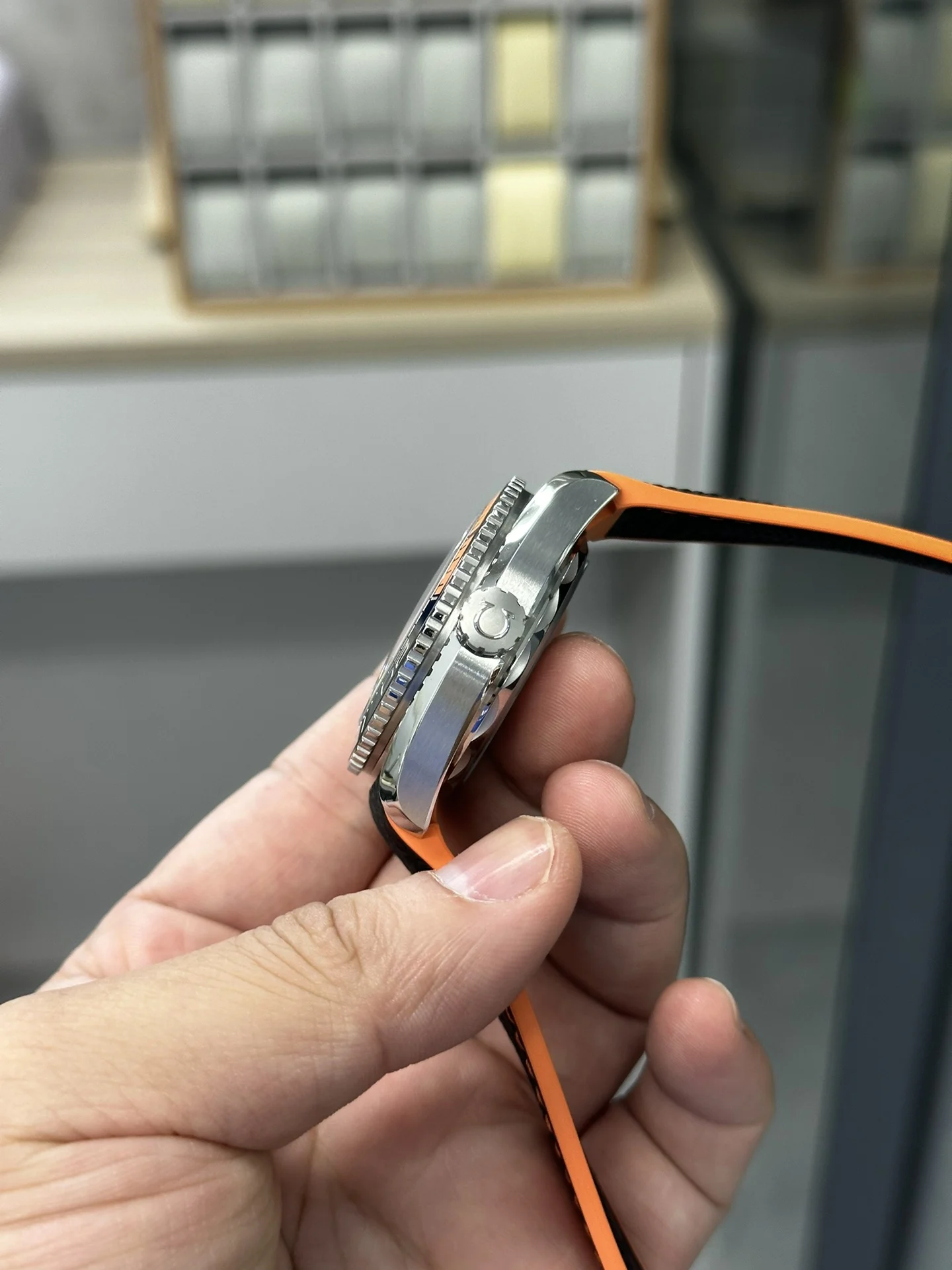 VS 41 Orange Rubber Strap 8900 Integrated Movement — photographed off the sweep
