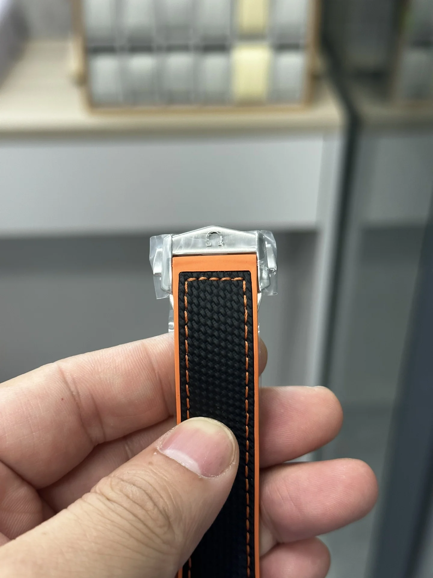 VS 41 Orange Rubber Strap 8900 Integrated Movement — photographed off the sweep