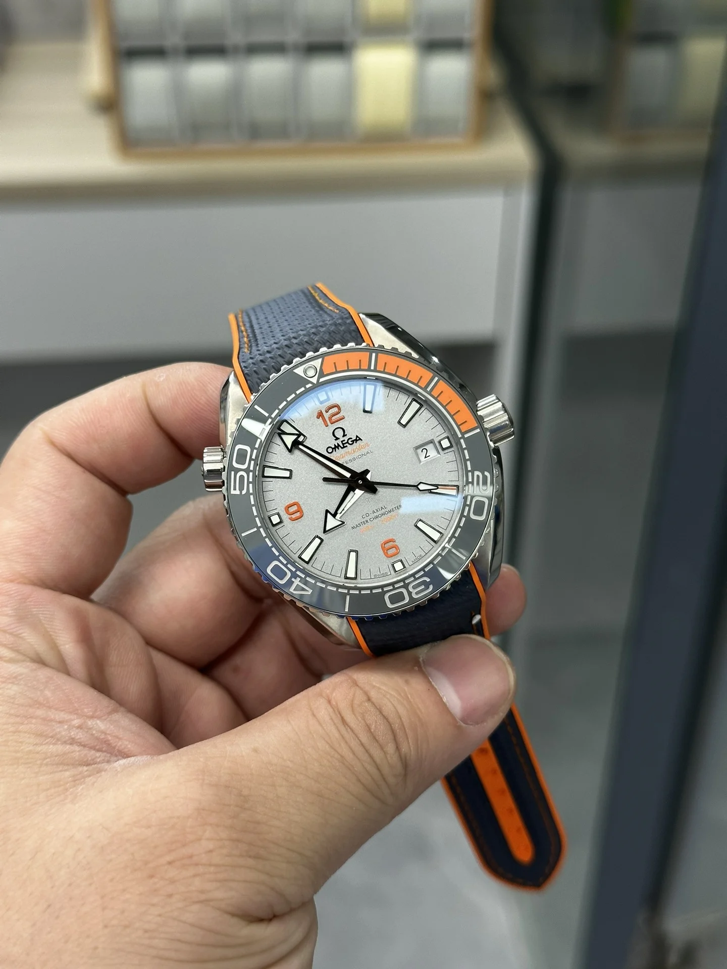 VS New Grey Titanium 4-in-1 Orange Rubber Strap 8900 Integrated — photographed off the sweep