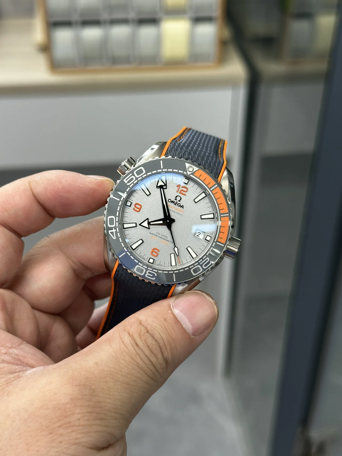 VS New Grey Titanium 4-in-1 Orange Rubber Strap 8900 Integrated — photographed off the sweep