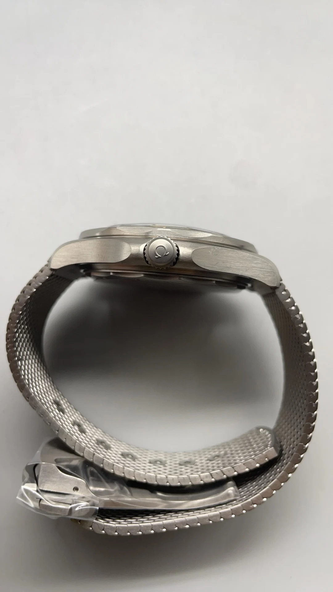 VSF, titanium, Flawless 007, New Movement, New Strap — photographed off the sweep
