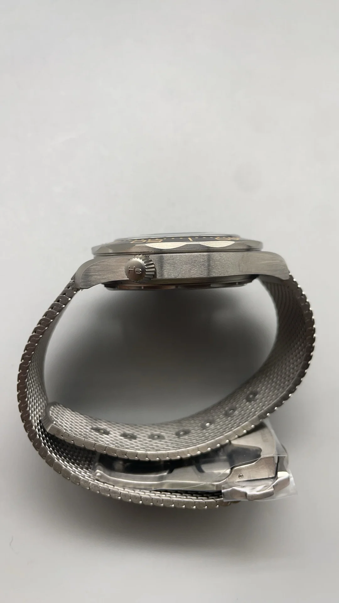 VSF, titanium, Flawless 007, New Movement, New Strap — photographed off the sweep